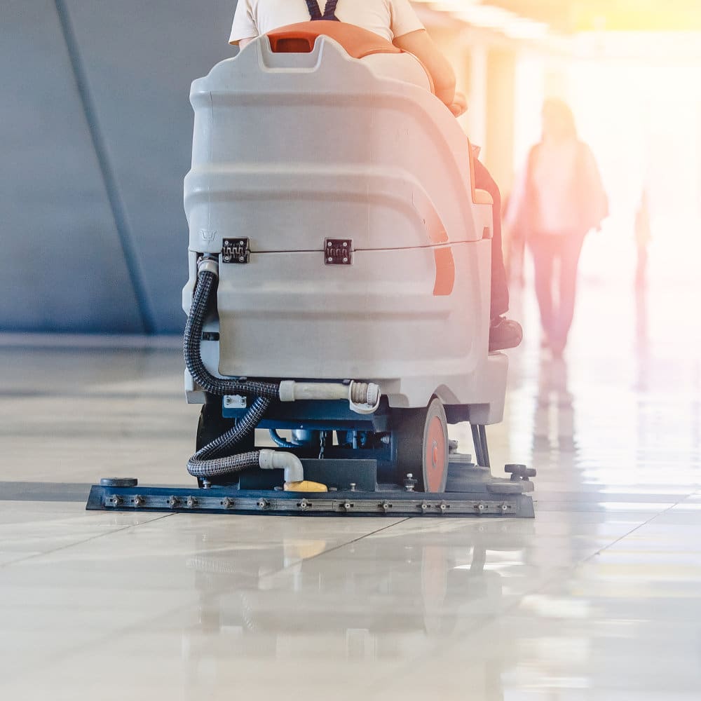 Close-up sweeper machine cleaning. Concept clean airport from debris.